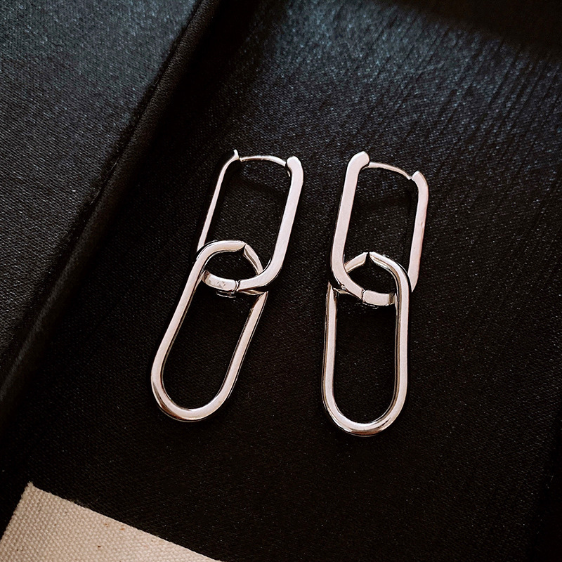 Aguja de plata Zircon en forma de U plisada pendientes curvados personalizada estilo frío serie de plata pendientes simples nichos pendientes de temperamento