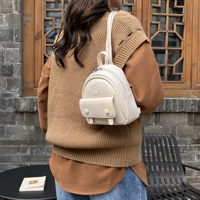 2025 mochila coreana de mujer simple color sólido mini mochila nueva bolsa de viaje ligera para mujeres