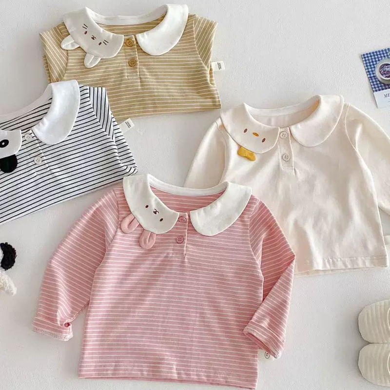 春と秋の女の子の子供服のtシャツの赤ちゃんの洋気の子供の個性の潮のかわいい漫画の耳のストライプの子供の襟の底のシャツ