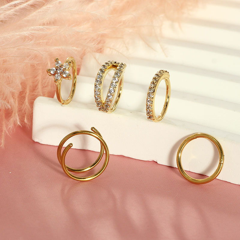 Nieuwe 15-delige set roestvrijstalen, grensoverschrijdende, populaire neuspiercings met open geometrische vormen en ingelegde zirkonia, inclusief koperen piercing._voghion.com