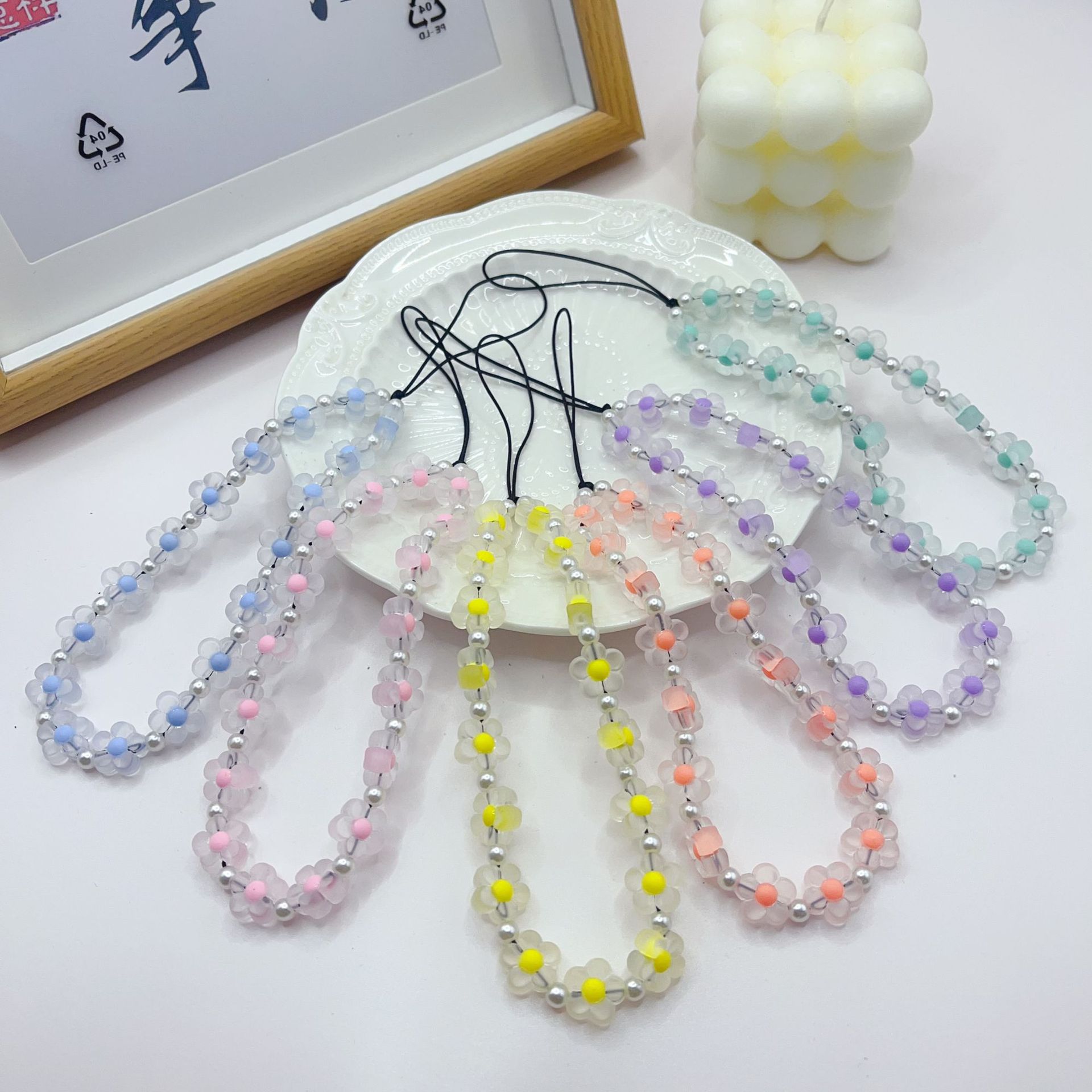 New fashion frosted flower Pearl mobile phone chain anti-drop mobile phone case wrist lanyard beaded pendant wholesale