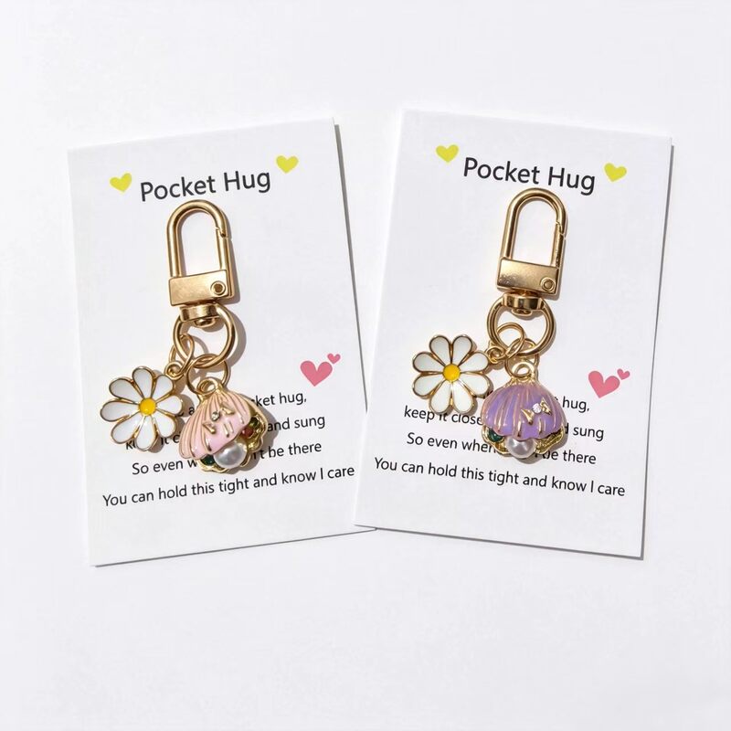 Cross-border English greeting diamond-encrusted shell daisy keychain ocean pearl scallop pendant bag decoration wholesale Cross-border English greeting diamond-encrusted shell daisy keychain ocean pearl scallop pendant bag decoration wholesale