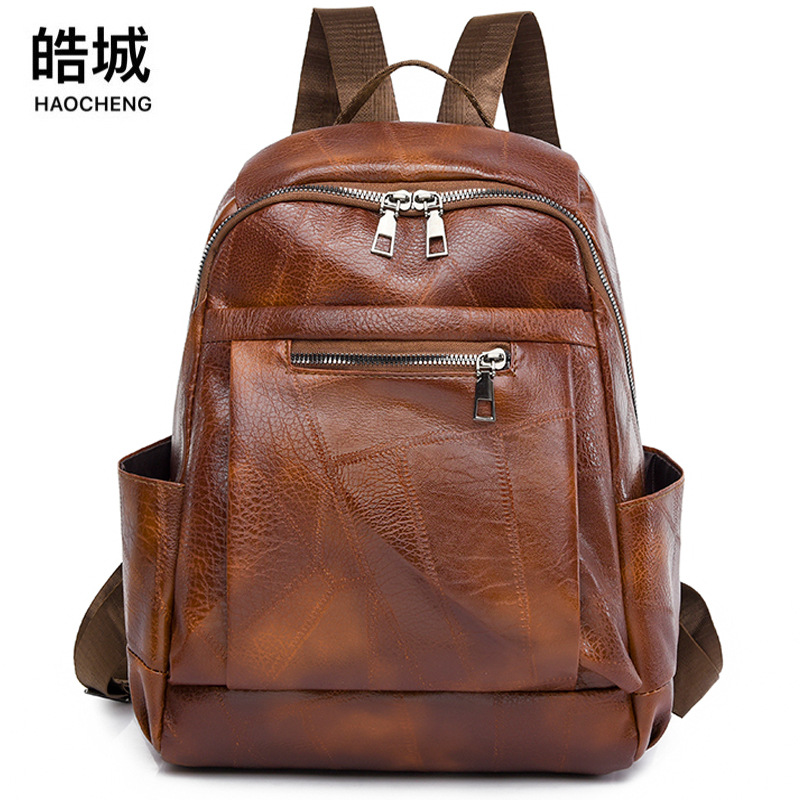 Comercio exterior al por mayor 2023 nuevo estilo casual señoras PU mochila de viaje al aire libre retro de moda mochila escolar de estudiante