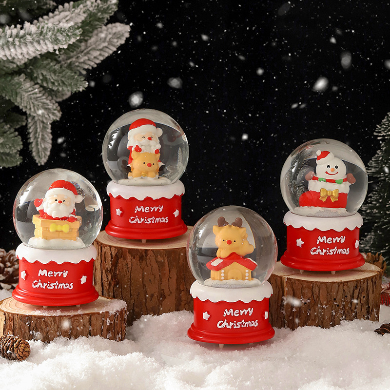 Una variedad de regalos de decoración de Navidad Navidad iluminante bola de cristal caja de música ventana diseño de velas lámparas de viento árbol de Navidad