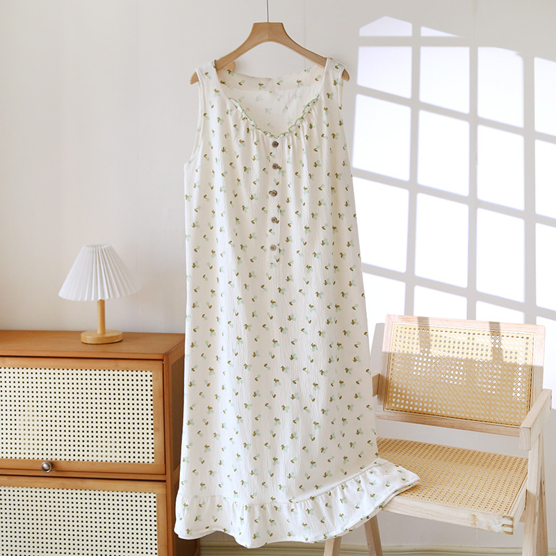 Knitted cotton summer sleevless dress with a round collar sleevless