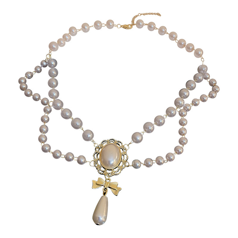 Elegante collana girocollo perle barocche con ciondolo oro_voghion.com