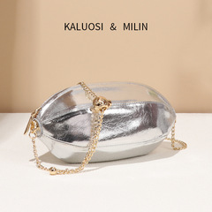 銀色牛皮金屬系橢圓流行斜挎橄欖球包化妝包真皮油蠟紋歐美貝殼包
