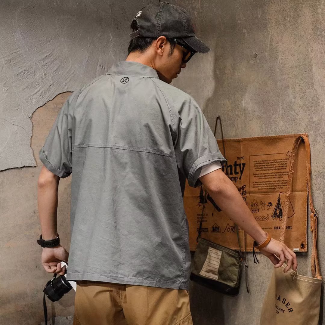 Moda 2024 verano nuevo estilo suelta camisa polo de manga corta para hombre diseño de manga de cinco puntos sentido tendencia camiseta de media manga