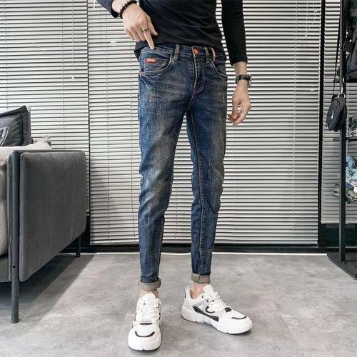 High-end blue denim jeans for men, autumn slim-fit skinny pants—versatile Korean-style casual stretch trousers that are trendy.