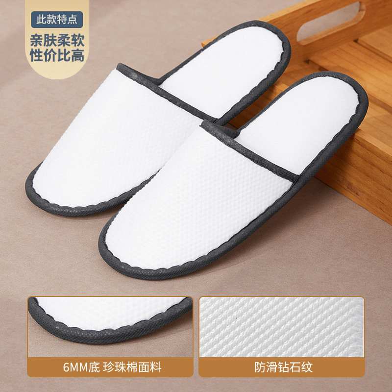 Pantuflas desechables de alta gama para hoteles, pantuflas específicas para huéspedes de hoteles y salones de belleza, pantuflas antideslizantes gruesas para casas de huéspedes.
