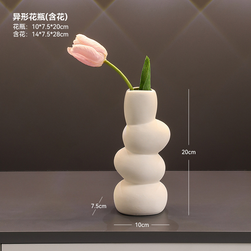 특별한 모양의 꽃병(꽃 포함)