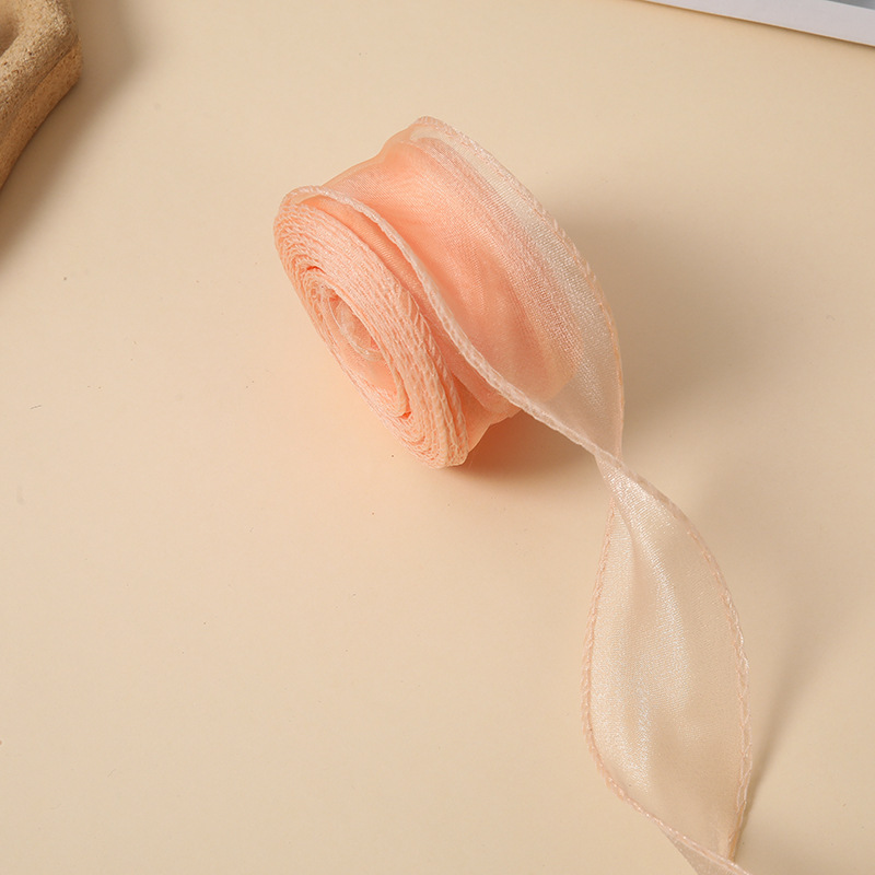 魚の尾の糸のリボンの花の花束の包装の波の糸はケーキの縁を焼きますクリスマスの装飾のリボンの花の芸のリボン|undefined