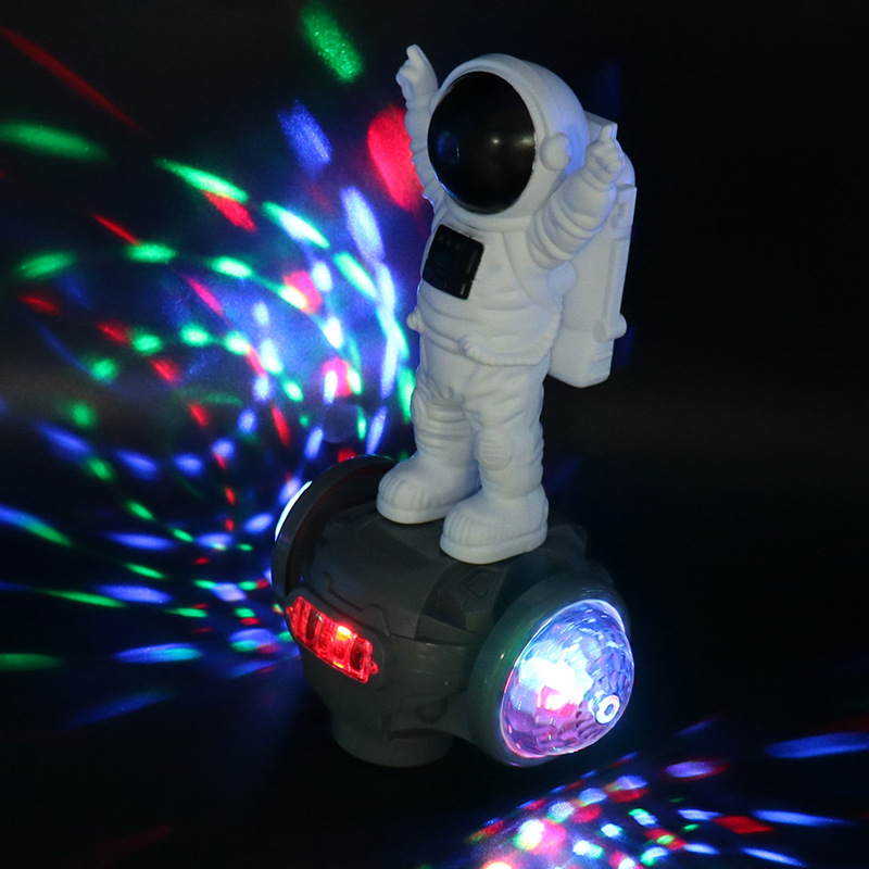 Vehículo de equilibrio de astronauta universal eléctrico para niños, luz de música colorida, carro de juguete para niños al por mayor