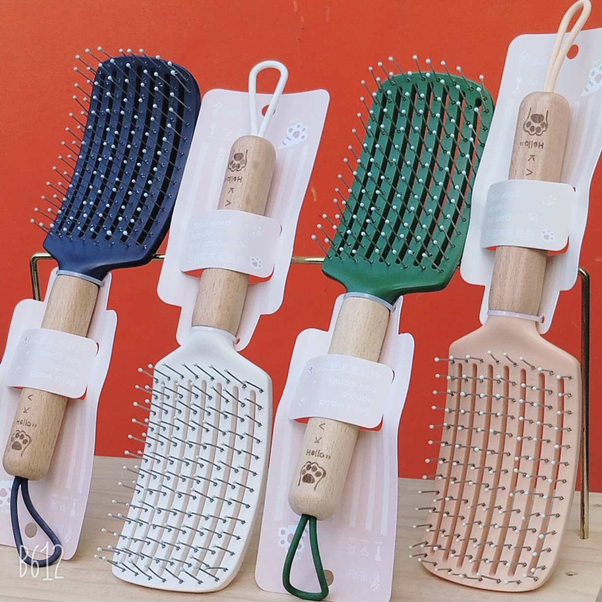 Bonito peine de peinado color macarrón con cojín de aire para masaje, adecuado para uso doméstico y dormitorios estudiantiles, cepillo de pelo de plástico suave con cojín de aire.