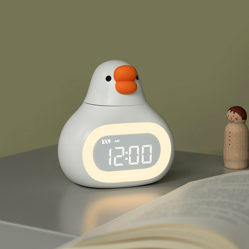 어린이 재미 NIGHTLIGHT 지능형 전자 알람 시계는 쉬운 설정을위한 작은 프로그램과 함께 제공됩니다.