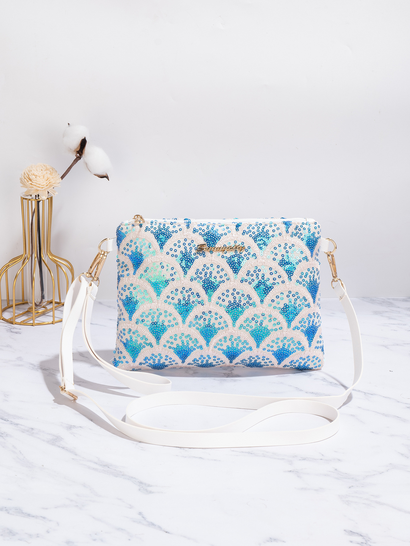 Nicho de estilo nacional de verano 2025 nueva cadena de moda alta sensación de moda sequinilla portátil bolsas de tramo oblicuas
