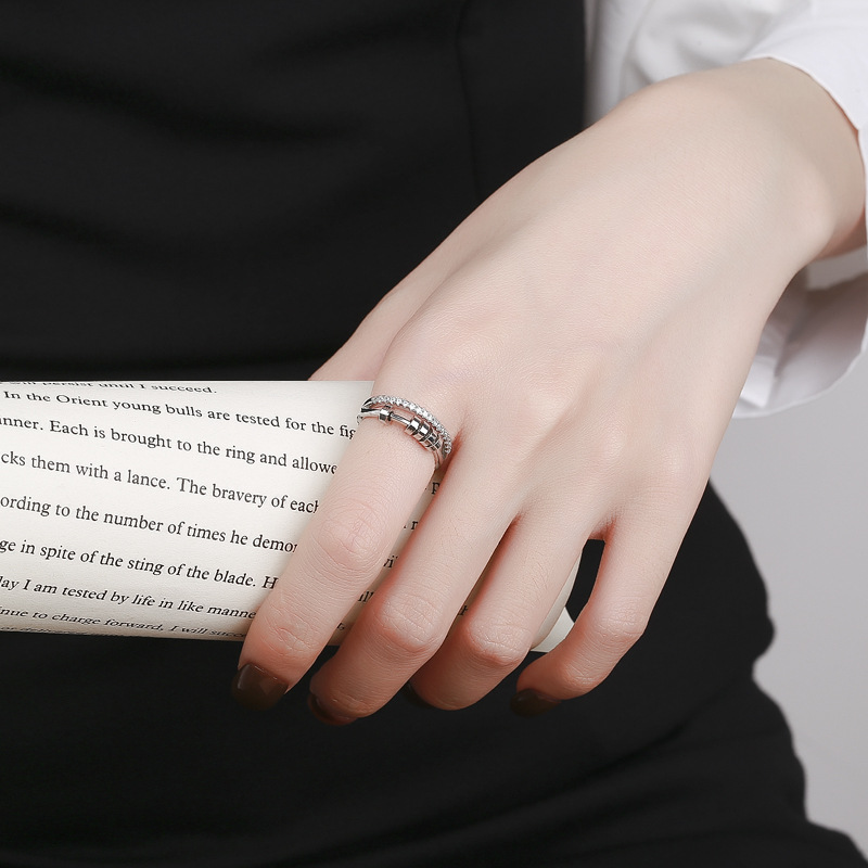 Europeo y americano transfronterizo caliente de cinco anillos de circón anillo giratorio Hipster hip hop personalidad giratoria anillo redondo anillo