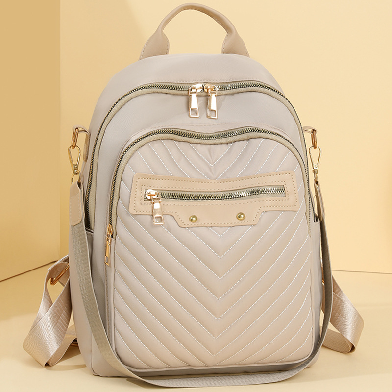 Mochila multifuncional de doble propósito para mujer 2024 otoño nuevo estilo nailon viajes al aire libre para mujer mochila casual mochila escolar marea