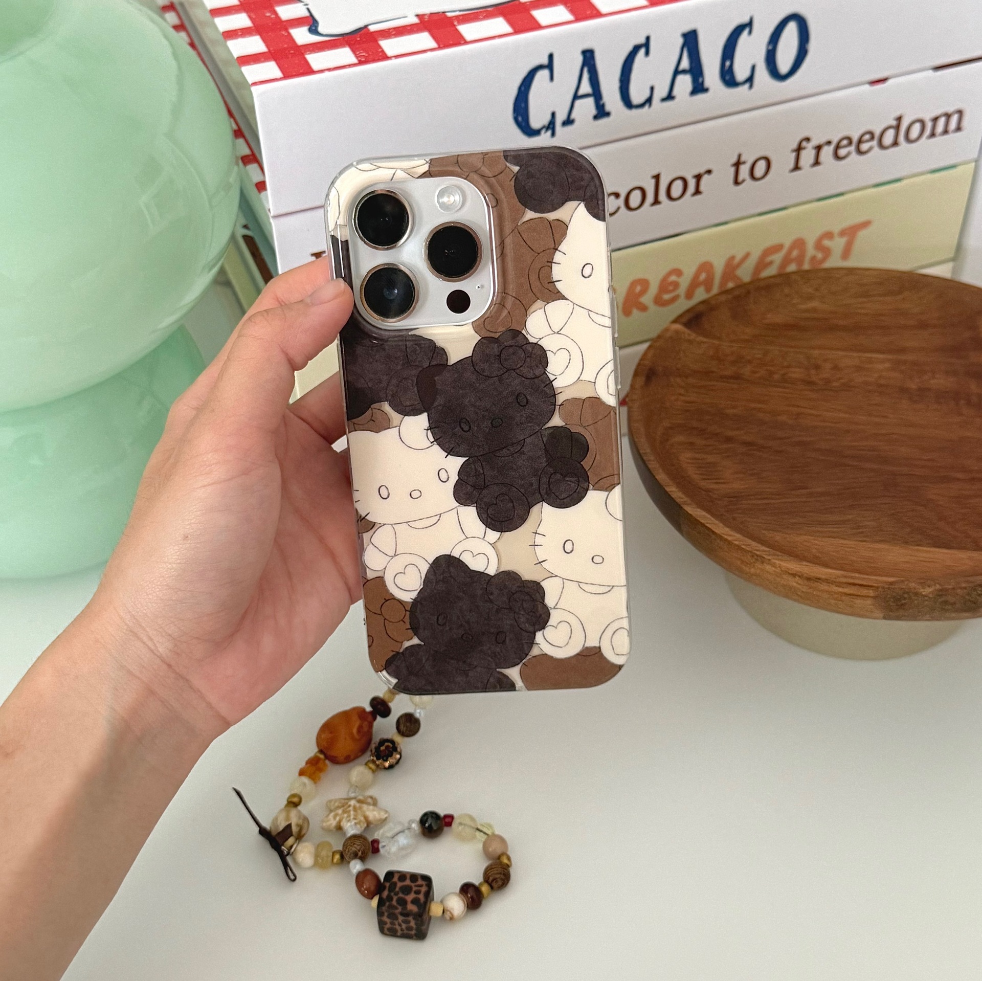 Divertida galleta de dibujos animados KT gato para Apple 16ProMax funda para teléfono móvil 15Pro nicho 14/13 cadena 15PM