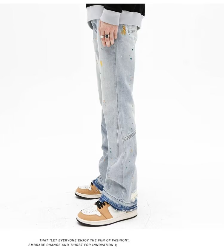 Jeans uomo slim fit stretch con strappi e taglio micro flare_voghion.com