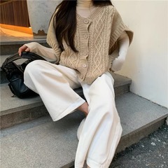 2025 韓国版の新しいコート女性のデザインニッチルーズノースリーブセーターベストツイストセーターベスト
