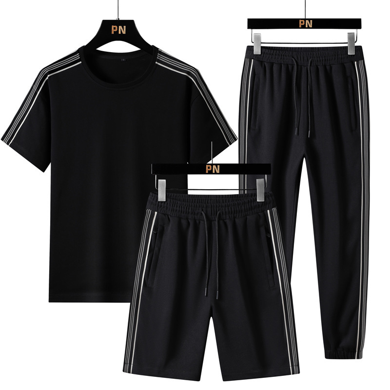 Verano nuevo estilo suelto tendencia hombre estilo Hong Kong camiseta de manga corta deporte de dos piezas marca de moda traje casual hombres y mujeres