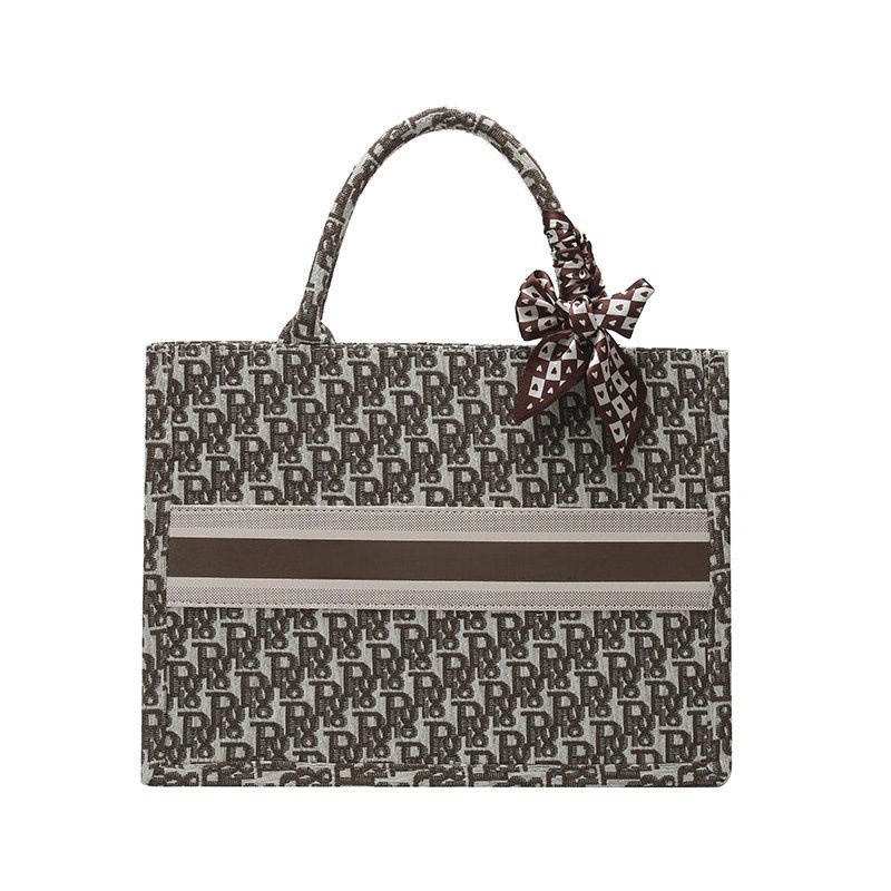 Bolsos bordados de alta calidad para mujeres 2026 nuevas letras de tela transfronterizas retro bolsas de mano de transporte de gran capacidad