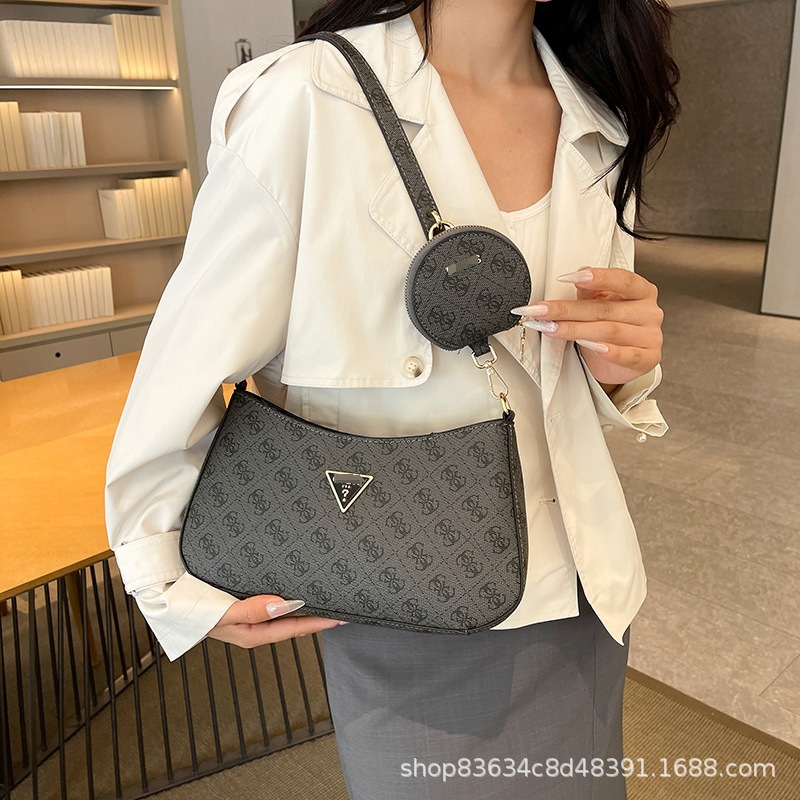 Comercio exterior al por mayor Europa y América Retro GS Adivina el bolso de la axila transfronterizo Nuevo estilo impreso bolso de madre e hijo bolso de hombro de moda