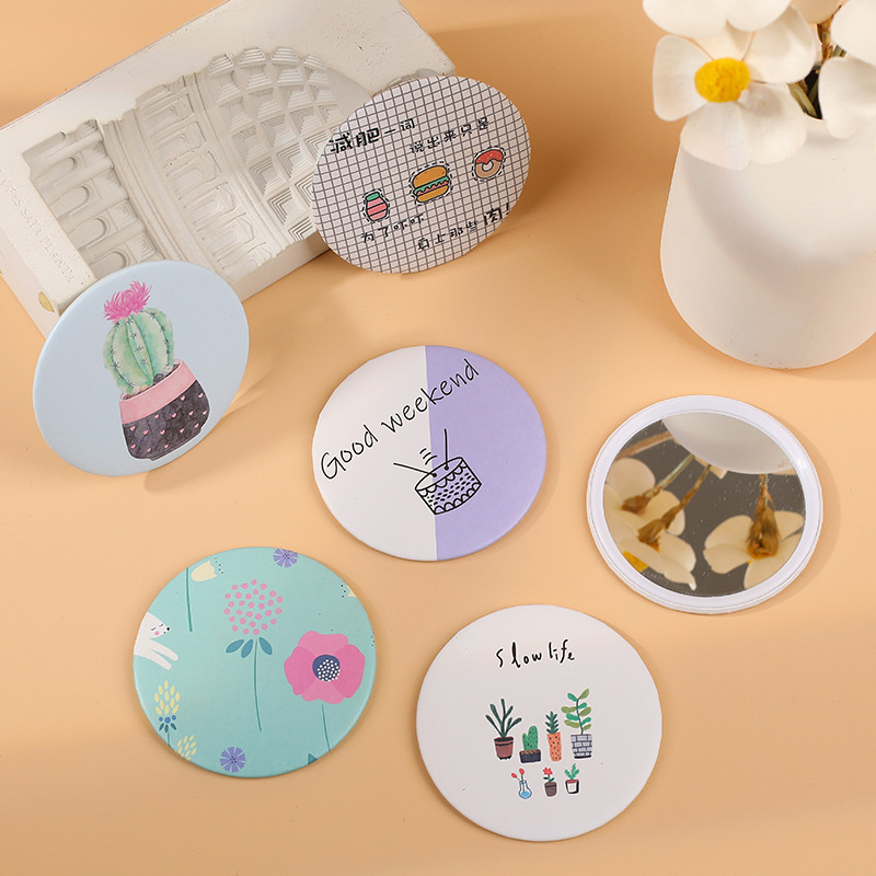 Espejo de maquillaje redondo pequeño fresco de estilo vegetal hogar encantador dibujos animados espejo de maquillaje plegable de alta definición espejo plegable de estudiantes