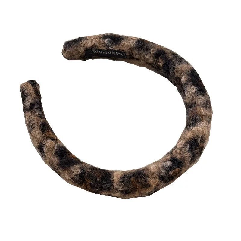 Otoño y invierno de alta calidad cordero estampado leopardo nuevo estilo de moda cabeza de cabeza de alto cinturón de peluche universal fuera de la tarjeta de pelo