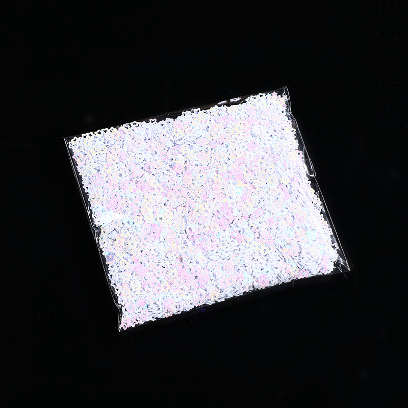 Nueva resistencia a altas temperaturas, brillo en polvo, plata láser, estrella de cinco puntas en forma especial, lentejuelas 1g, accesorios de uñas PET