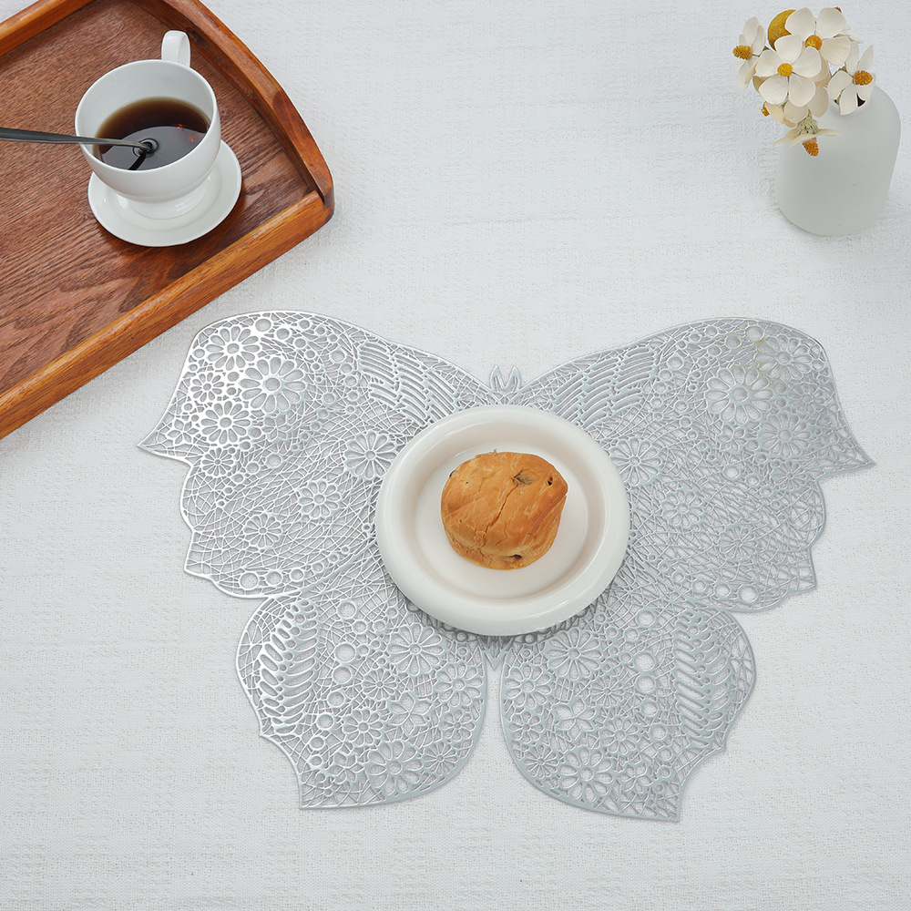 Nueva mariposa placemat hueco dorado PVC occidental placemat polvo de plata aislamiento térmico antideslizante estera de mesa de montaña restaurante Decoración