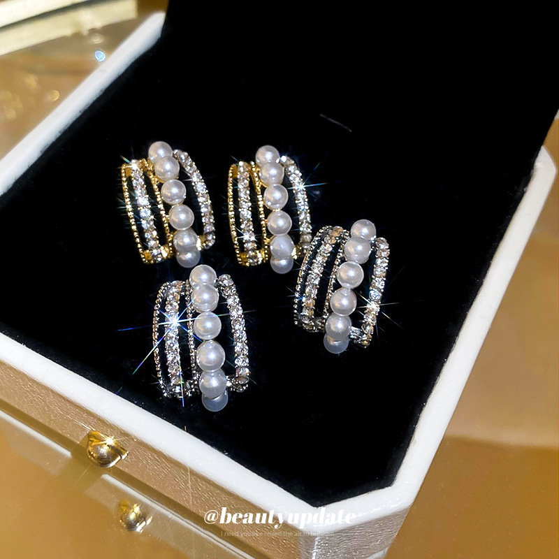 Pendientes de diamantes multicapa de perla con aguja de plata Pendientes de diseño de nicho francés Pendientes de temperamento de alta calidad de lujo ligero al por mayor femenino