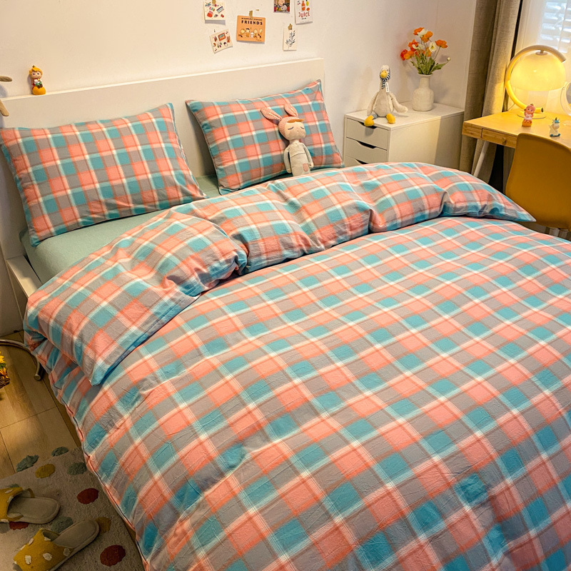 Una clase de algodón cuatro piezas de tejido de agua lavado sábanas de algodón cubierta dormitorio de estudiantes cama de tres piezas de impresión y teñido activo