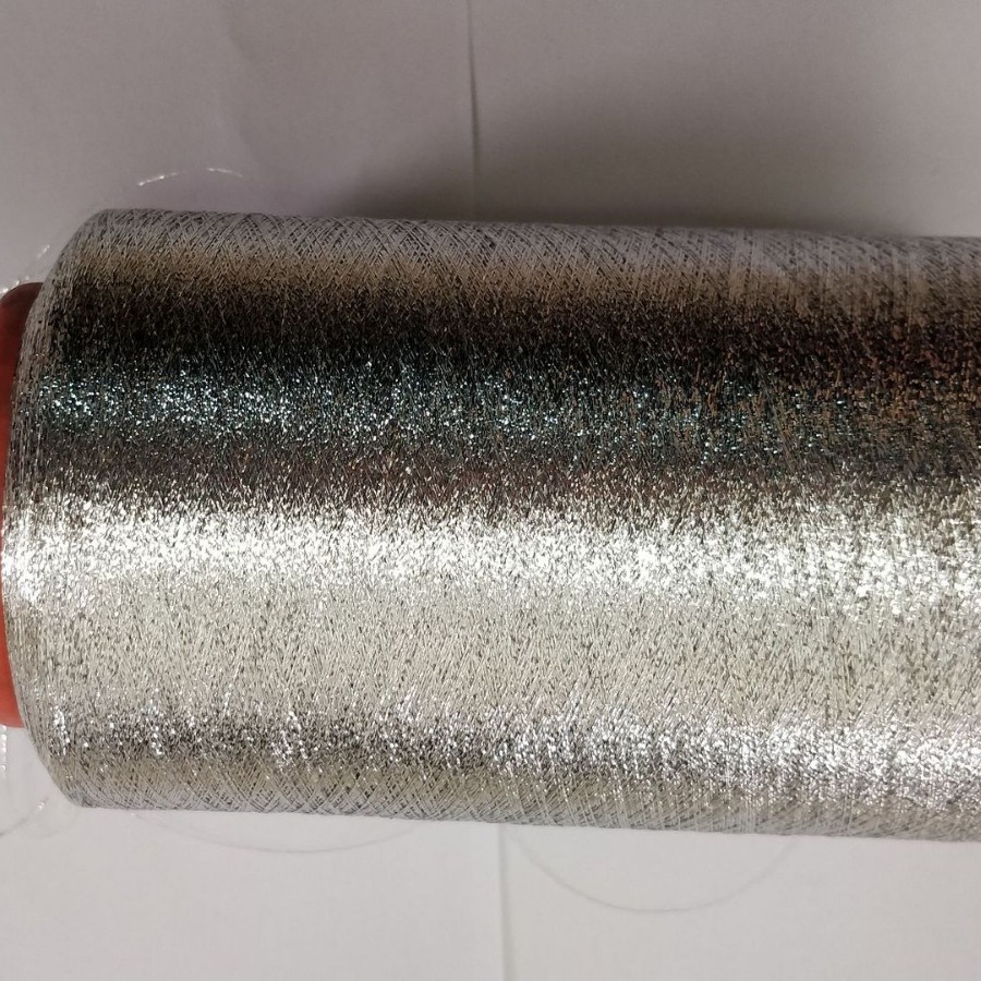 极深颜色的金线拧涤纶黄丝纱线黑色铝箔丝并涤纶黑丝混纺纱织下摆