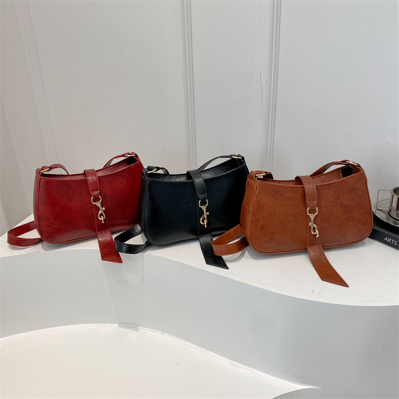 Bolsa de brazo francesa nicho para mujeres 2025 primavera y verano nueva moda moda personalidad bolso de palo estilo coreano bolso de hombro retro