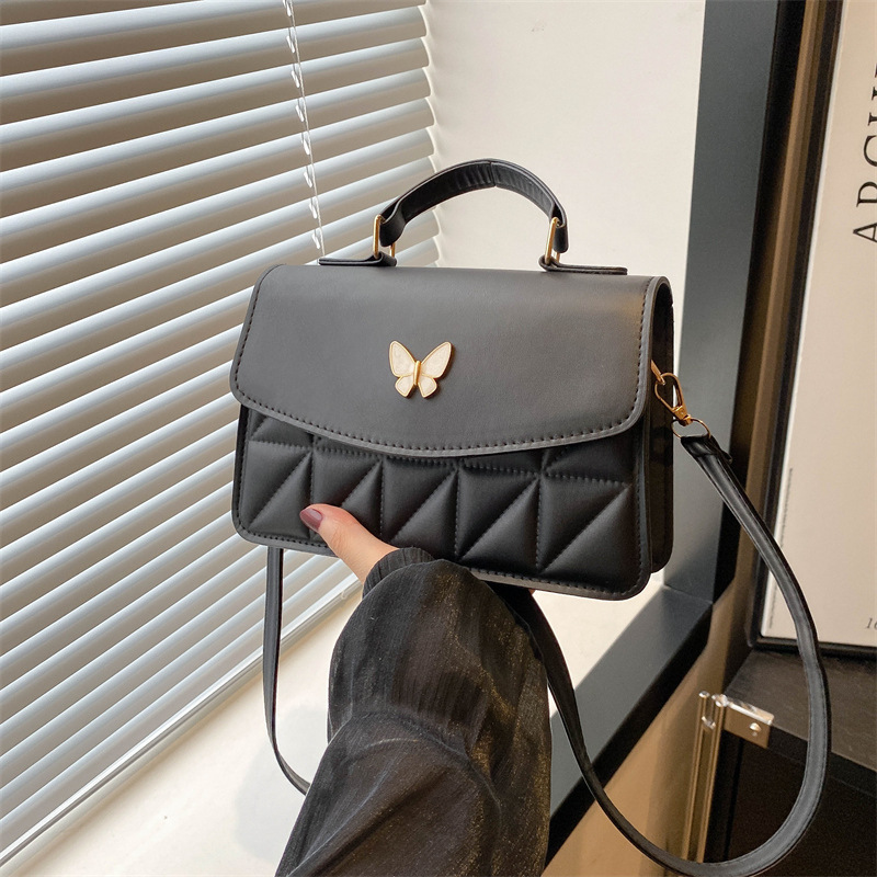 Bolsas para mujeres 2024 verano nuevo diseño de nicho de mariposa de alta calidad estilo de moda de diamante universal de hombro pequeño bolso de moda