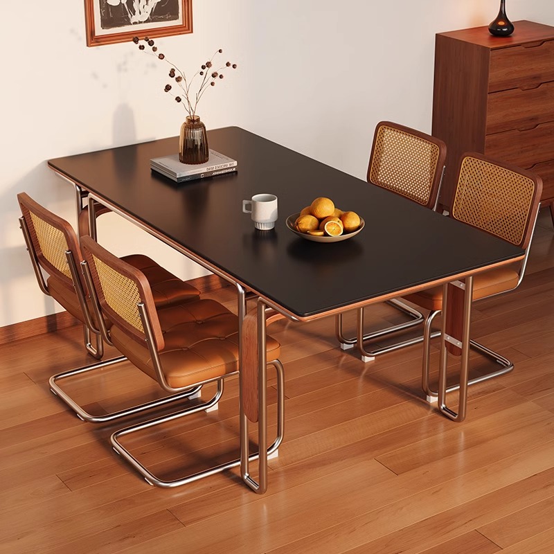 Mesa de comedor de madera maciza de tablero de roca Bauhaus de estilo medio 2025 nuevo estilo rectángulo negro de alta gama para el hogar pequeño apartamento