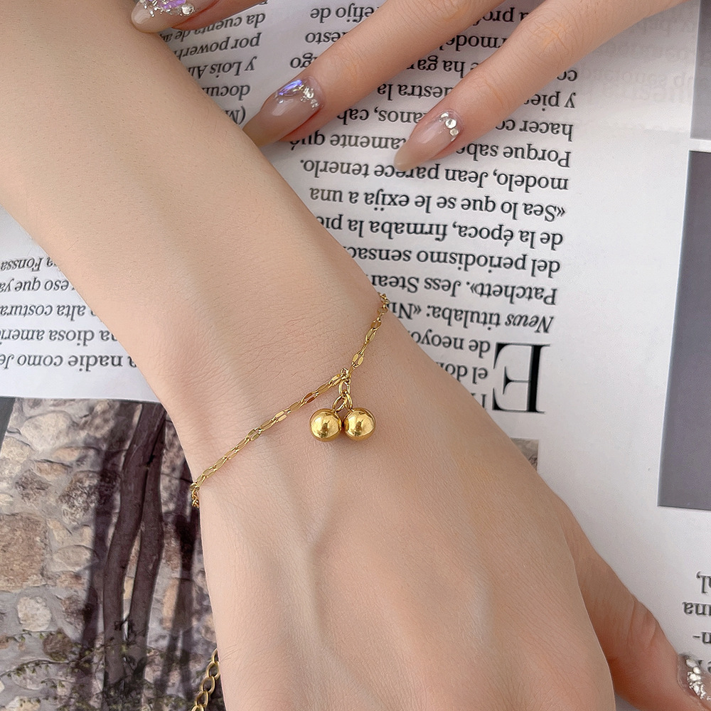 Wenjian Corea del Sur simple estrellado dos bolas titanio acero chapado en oro tobillera personalidad femenina moda Mori diseño de moda