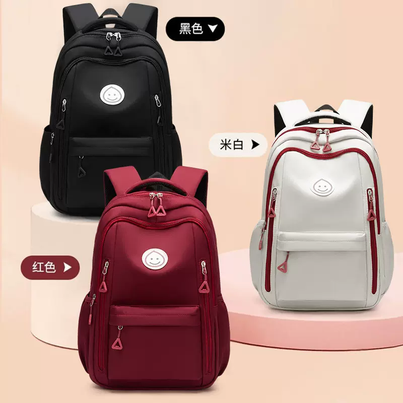 纯色笑脸儿童书包简约轻便双肩包大容量减负防泼水小学生书包批发