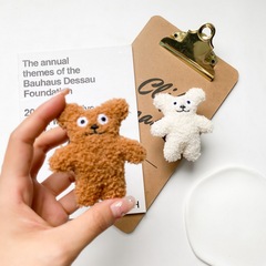 Cute Japanese-Korean Instagram-style plush mini bear phone holder—extendable, adhesive design, perfect for binge-watching!