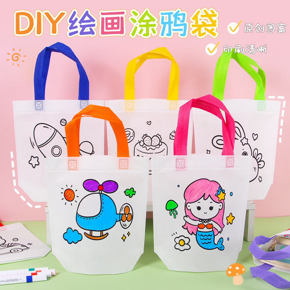 Niños hechos a mano DIY pintando bolsas de graffiti regalo de estudiantes dibujos animados no tejidos pintura relleno bolsas de tela portátiles ecológicas