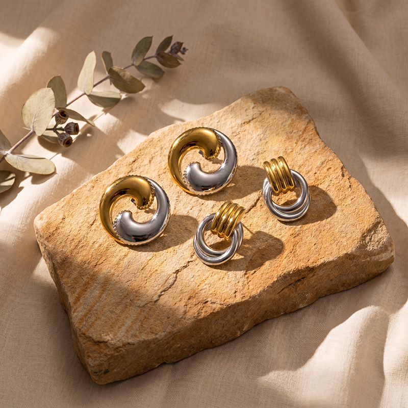 TENA Europa y los Estados Unidos transfronterizos en línea de color oro y plata aretes geométricos minimalistas de diseño de personalidad aretes al por mayor