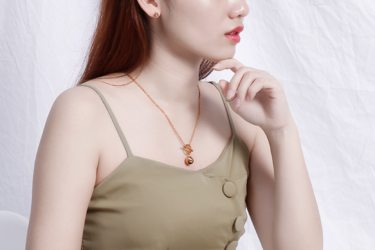 simple fashionable golden ball OT buckle necklace earrings stainless steel set wholesale nihaojewelr