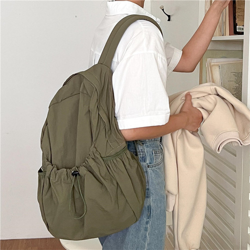 Korean style new college student backpack commuter women's large capacity casual drawstring pleated design nylon backpack for women