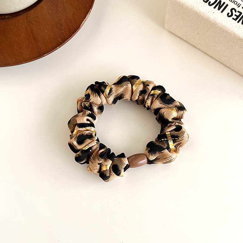 Temperamento europeo y americano estampado leopardo anillo de cabello simple de alta elástica cuerda de cabello gruesa cuerda de cabello de bolas duradera correa