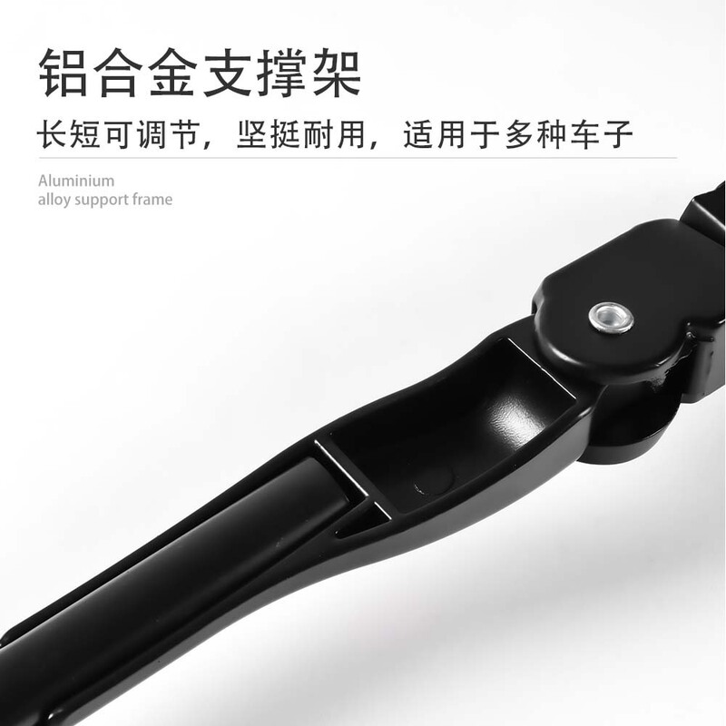 マウンテンバイクで自転車を支えている自転車は、道路車で黒/白を支えている|undefined