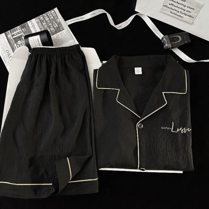 2025 nuevo pijama negro simple pantalones cortos de manga corta de verano para hombre traje juvenil ropa de hogar informal