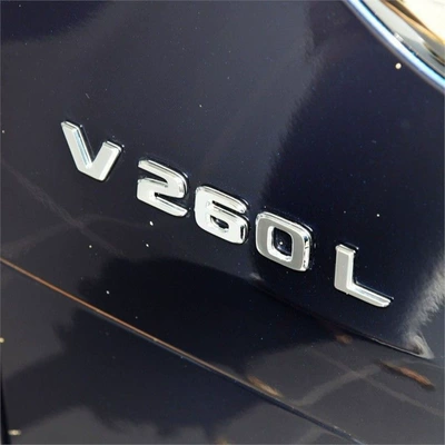 tail emblem, VS980L lettering, Car logo