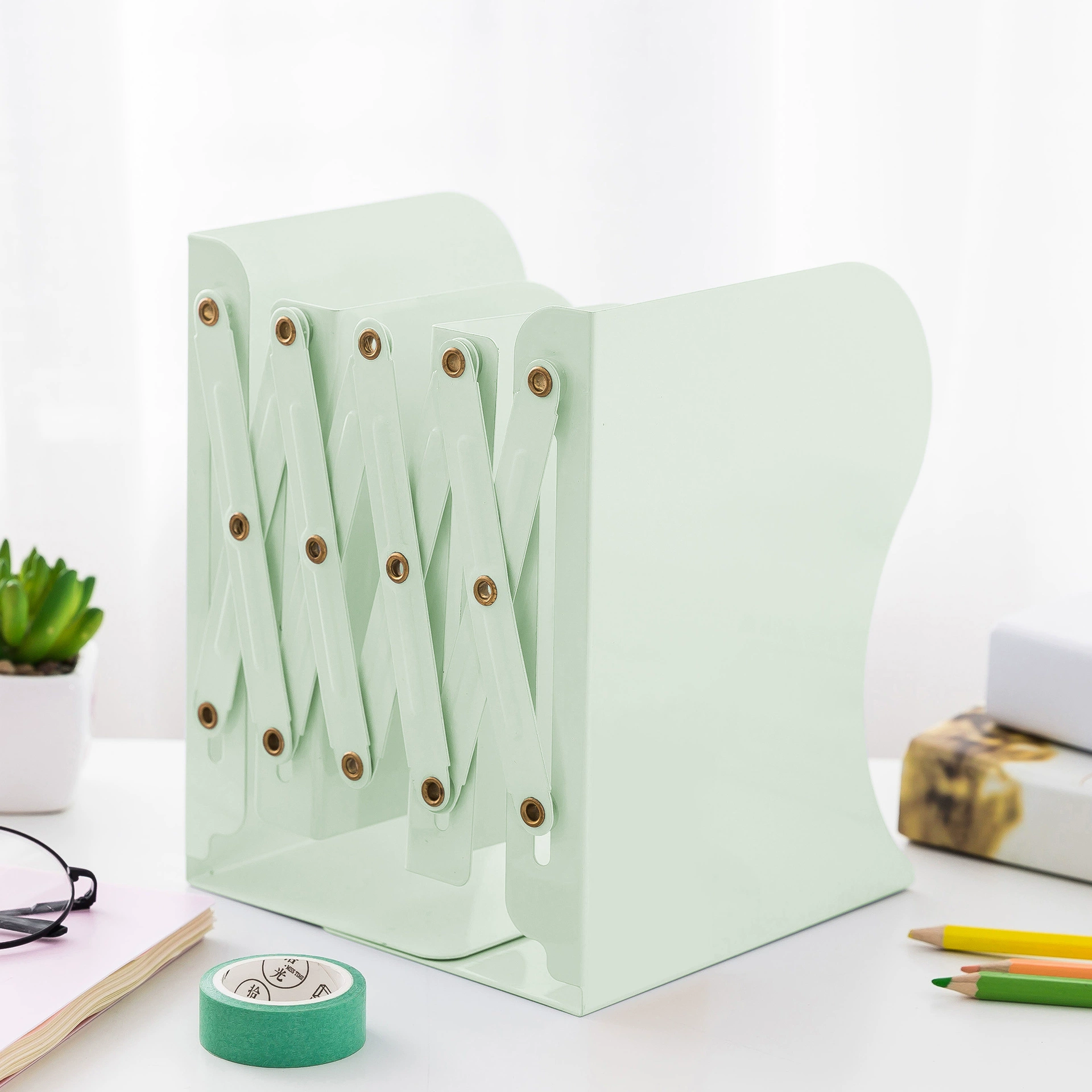 Factory direct sales explosion creative stationery supplies telescopic book holder folding book frame metal students cartoon